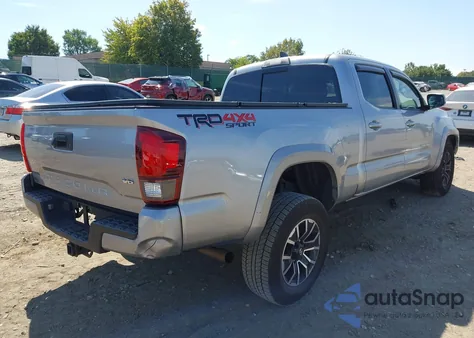 2018 Toyota Tacoma Trd Sport z USA, uszkodzony, nr VIN 3TMDZ5BNXJM053428